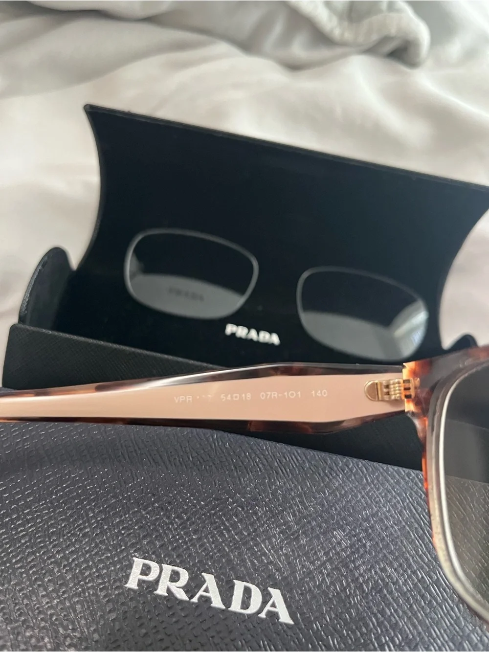 Prada Eyeglasses VPR 54018 07R-101 140